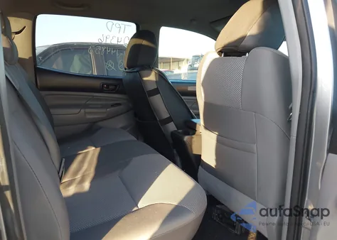 2014 Toyota Tacoma Base V6 z USA, uszkodzony, nr VIN 3TMLU4EN1EM144853